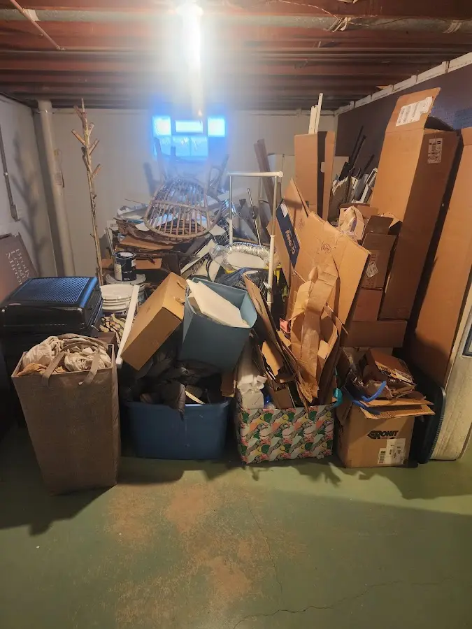 Roll-off dumpster container at job site for 6 Yard Dumpster Rental in Torrington